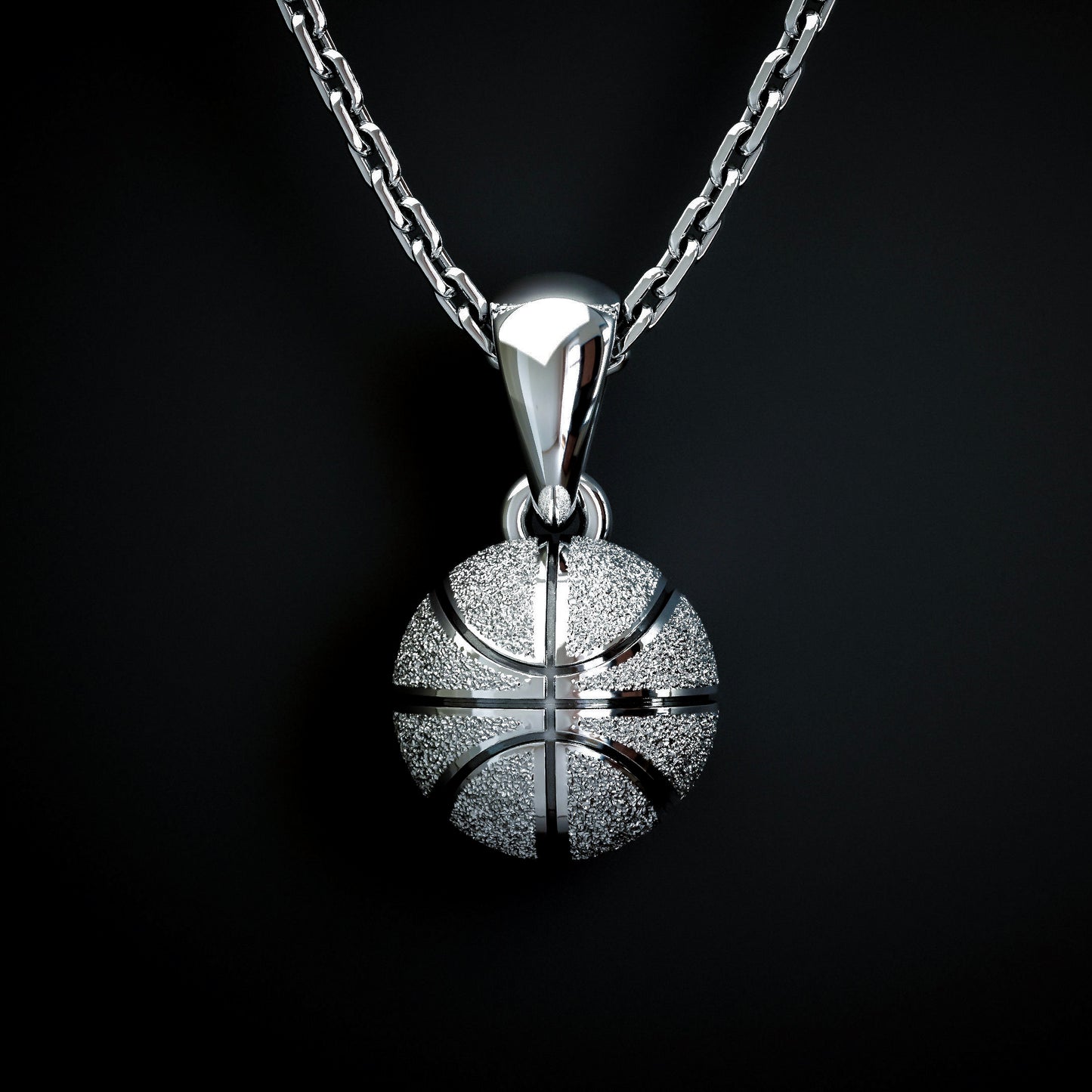 Silver basketball necklace pendant, by QJ Jewelry, on a black background