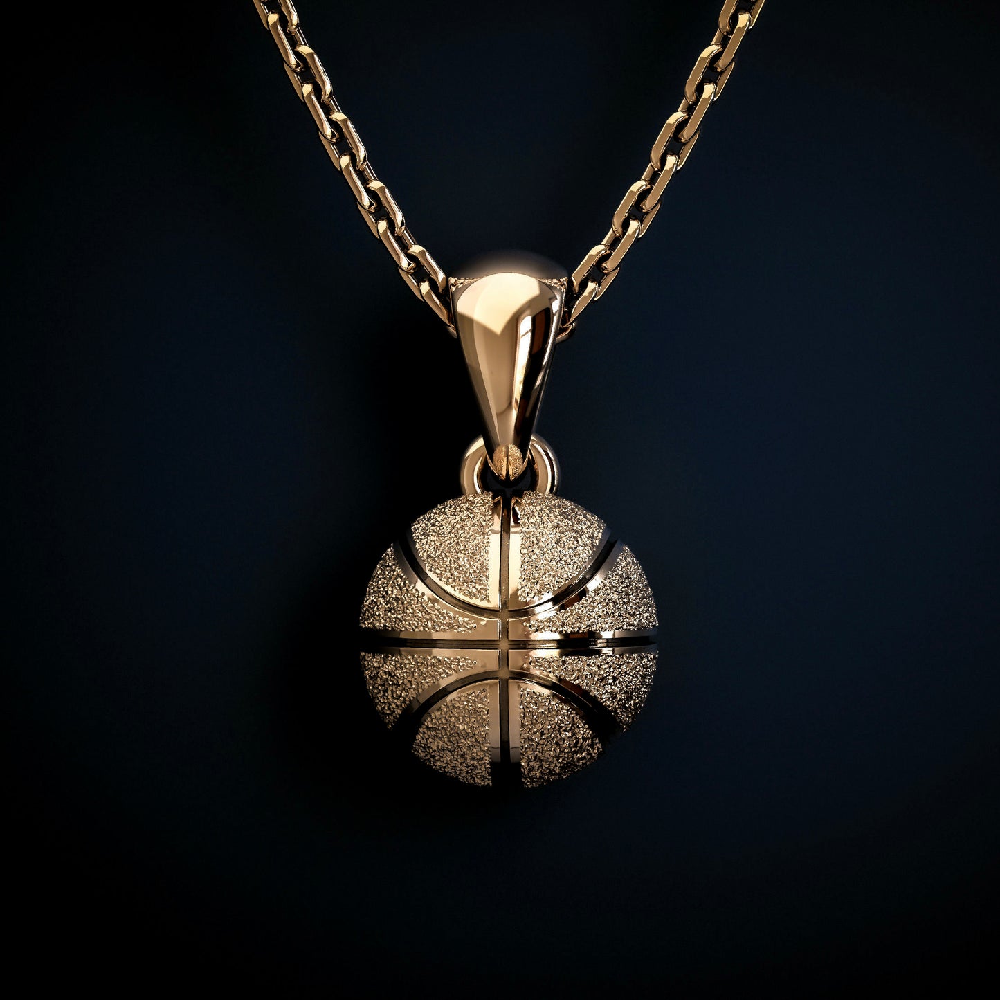 Gold basketball necklace pendant, by QJ Jewelry, on a black background
