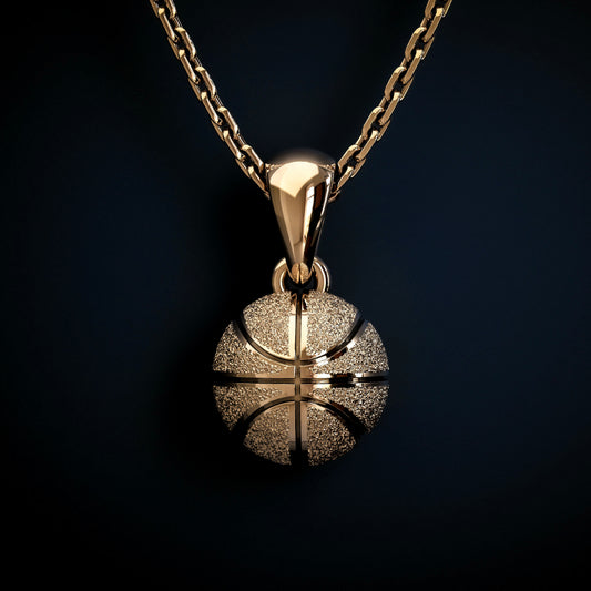 Gold basketball necklace pendant, by QJ Jewelry, on a black background