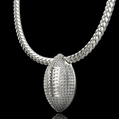 Silver football necklace pendant with diamonds, by QJ Jewelry, on a black background