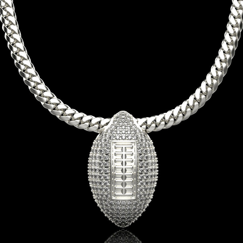 Silver football necklace pendant with diamonds, by QJ Jewelry, on a black background