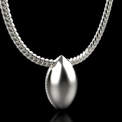 Silver football necklace pendant with diamonds, by QJ Jewelry, on a black background