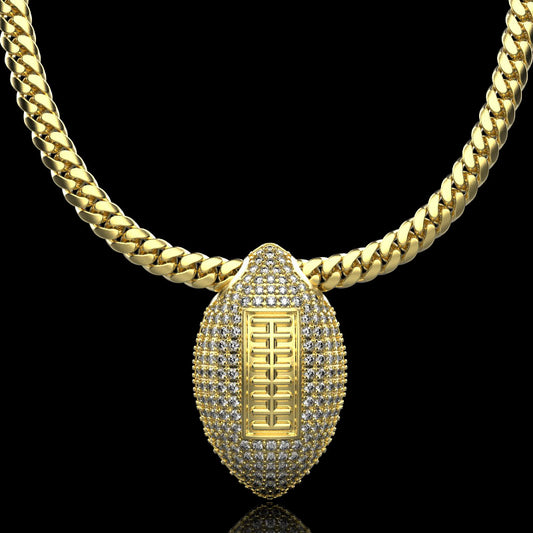 Gold football necklace pendant with diamonds, by QJ Jewelry, on a black background