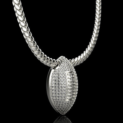 Silver football necklace pendant with diamonds, by QJ Jewelry, on a black background